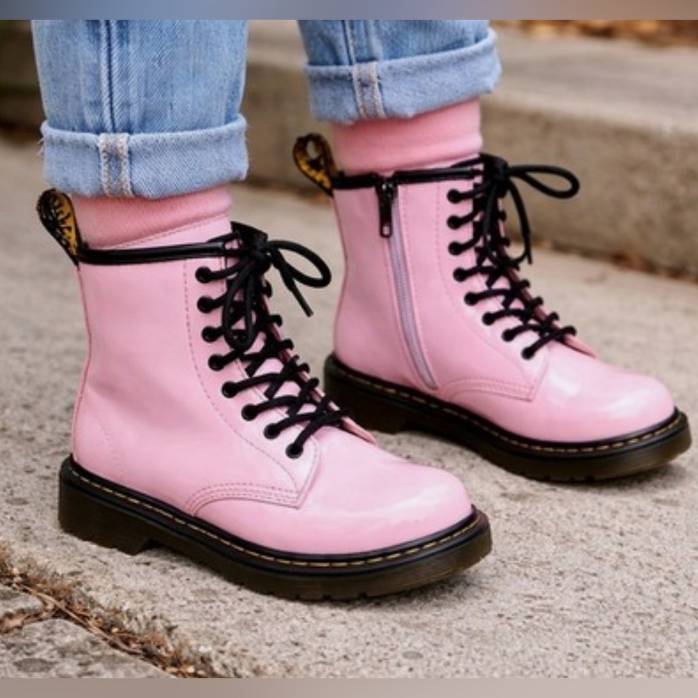 Dr. Martens Junior 1460 Patent Leather Lace Up Girls’ Boots in Pale Pink.